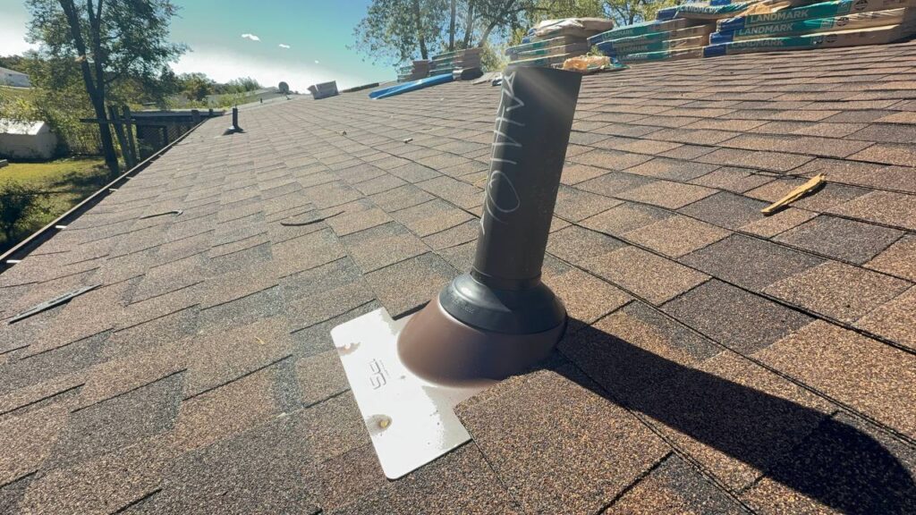 Roofing contractor inspecting Saint Louis roof